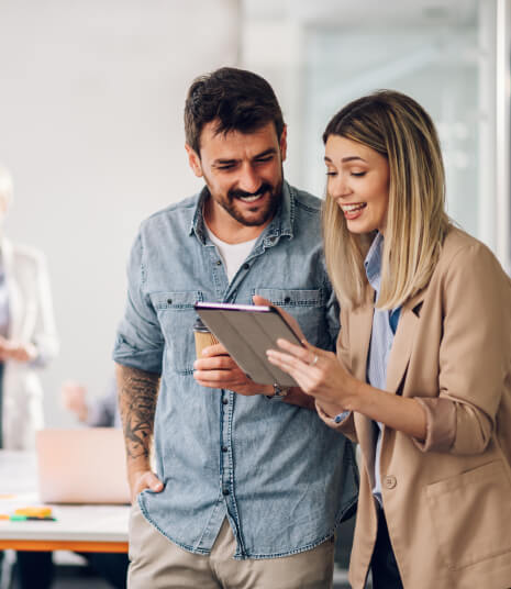 Two business professionals collaborating in an office