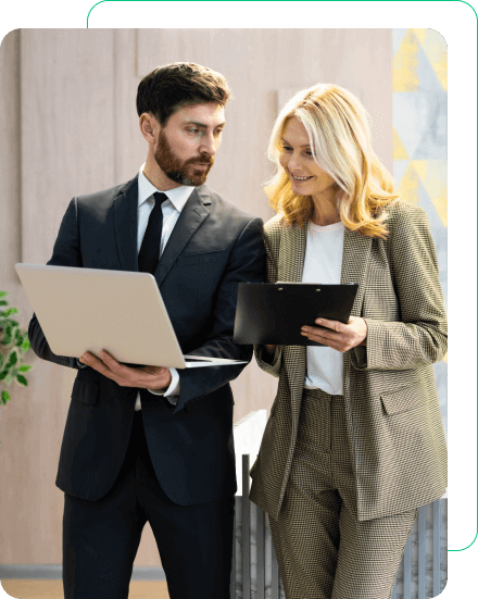 Two business colleagues reviewing documents together